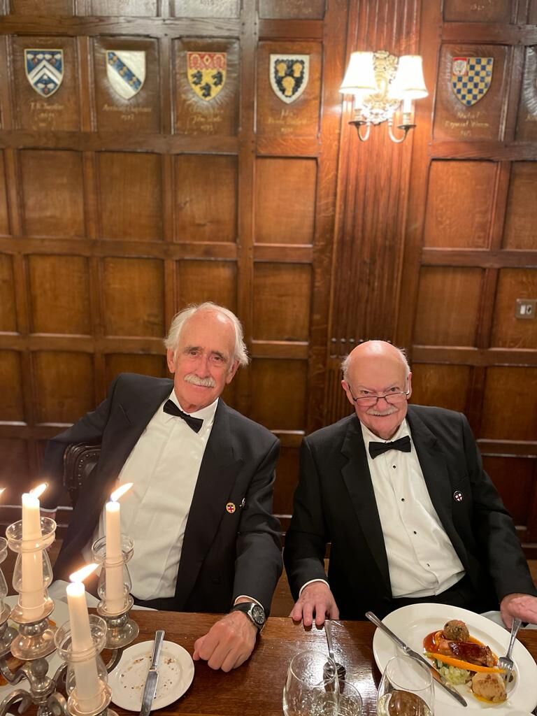 Dinner by candlelight beneath the heraldic shields of Ironmongers' Hall