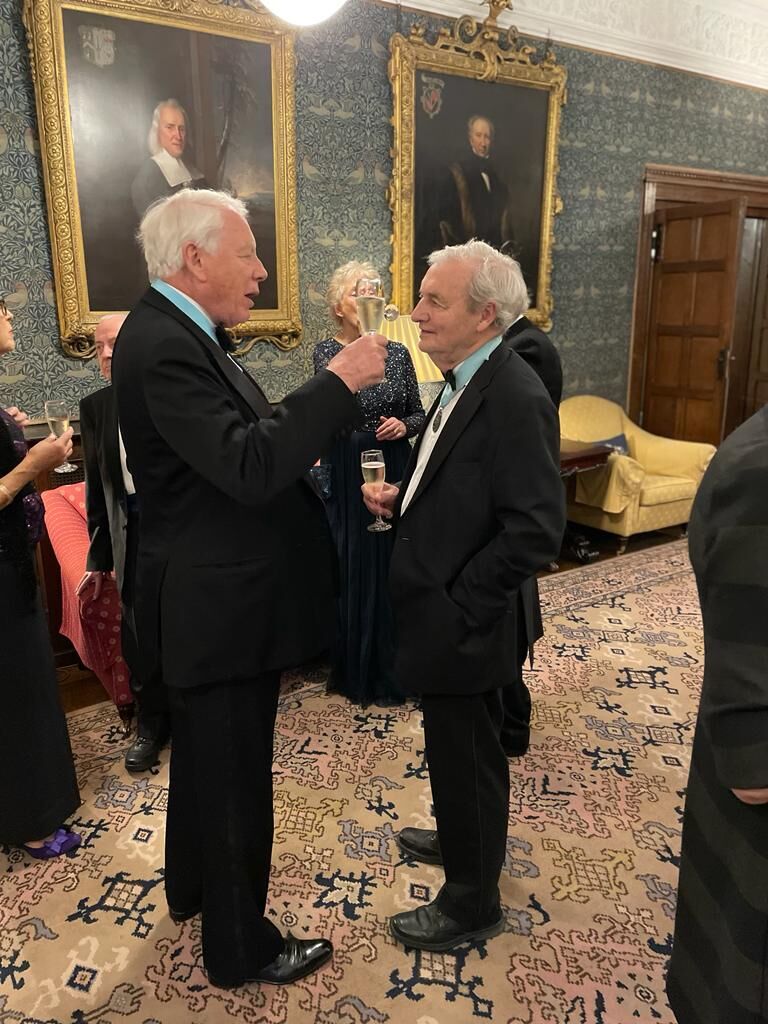 Old Blues renewing friendships at the reception